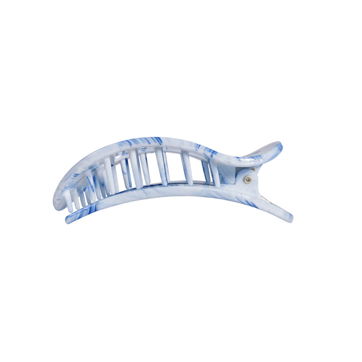 Blue and white marbled flat round hair clip, durable plastic, curved vented design, bendable teeth. Available in S/M/L.