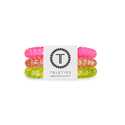 Set of three neon pink, orange, and yellow coiled TELETIES Hair Ties. Available in small and large sizes.