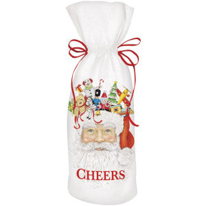 Holiday Wine Bottle Bag in white fabric featuring a Santa Claus face, Christmas toys, red “CHEERS” text, and a drawstring top.