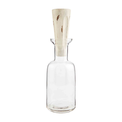 Clear glass decanter with wide base, narrow neck, and mango wood stopper. Available in multiple sizes.