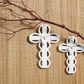 Scalloped ceramic crosses with intricate cut-out details; available in small and large sizes.
