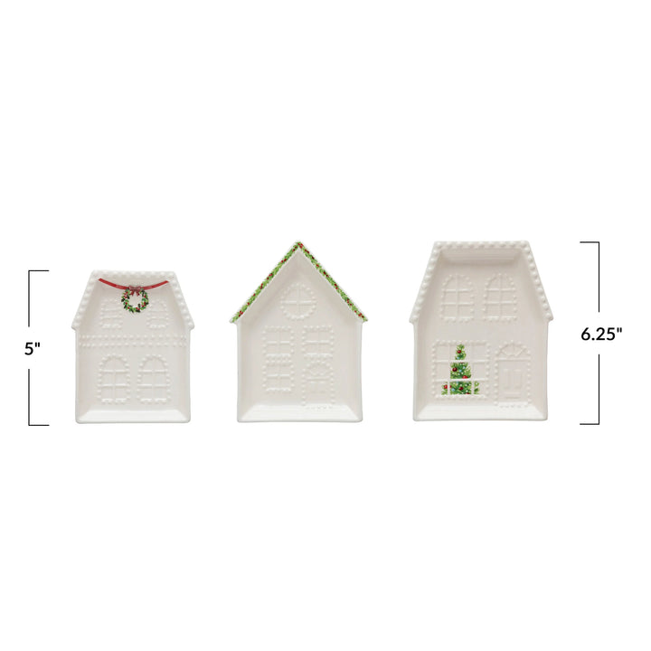 Three Embossed Stoneware House Plates in 3 styles, white and house-shaped, ranging from 5 to 6.25 inches tall.