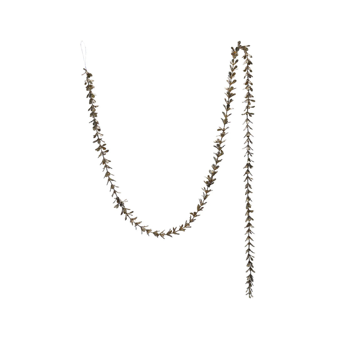 72″L x 1″H Faux Boxwood Garland with Glitter in champagne finish.