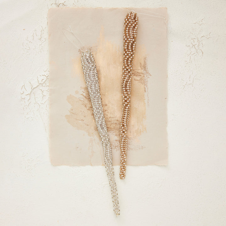 Silver and gold 10″H metal rhinestone icicle ornament.