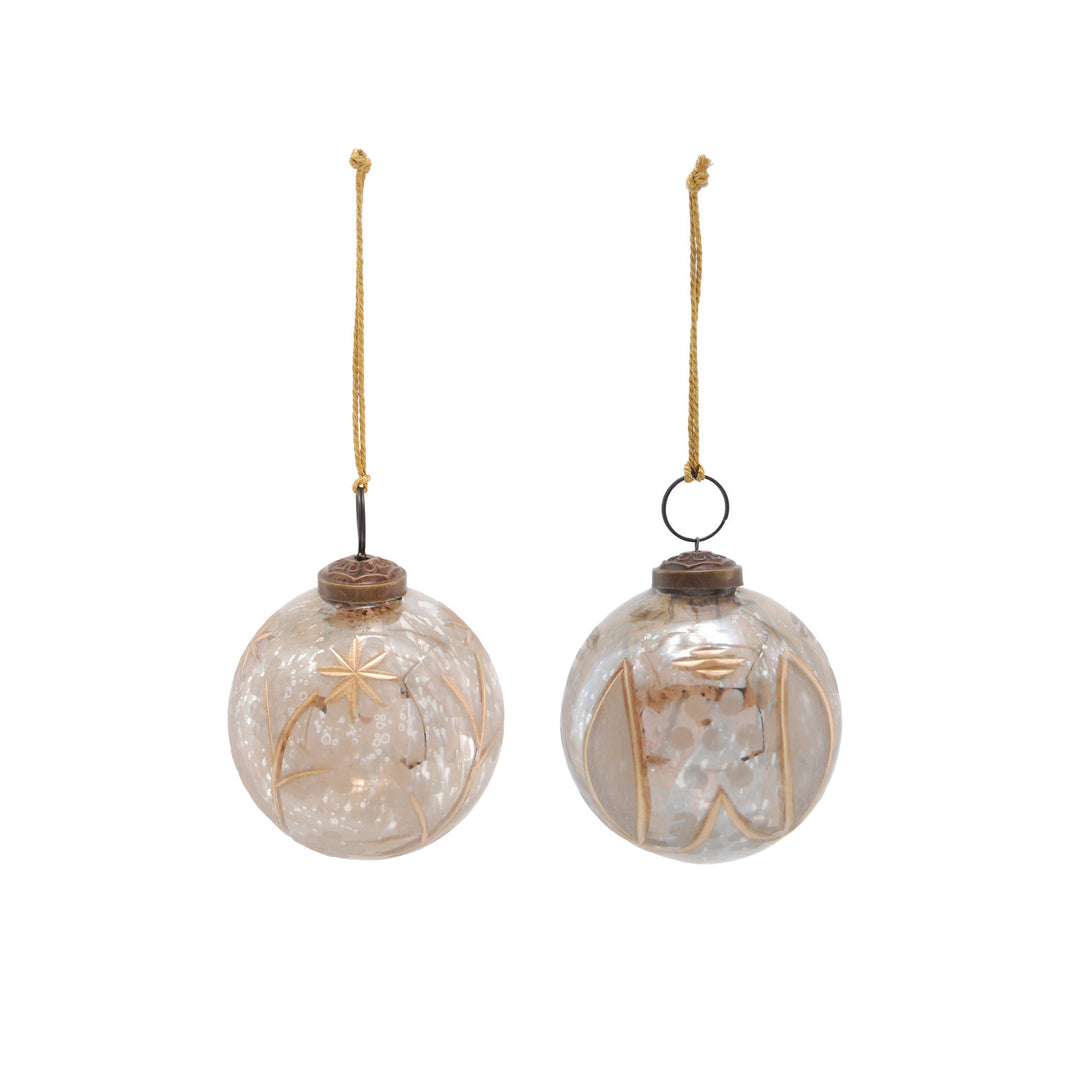 Two spherical etched mercury glass ball ornaments with metal caps and hanging cords.