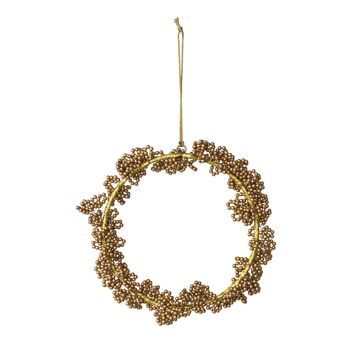 Gold handmade metal beaded wreath ornament with a circular wire frame and hanging loop.