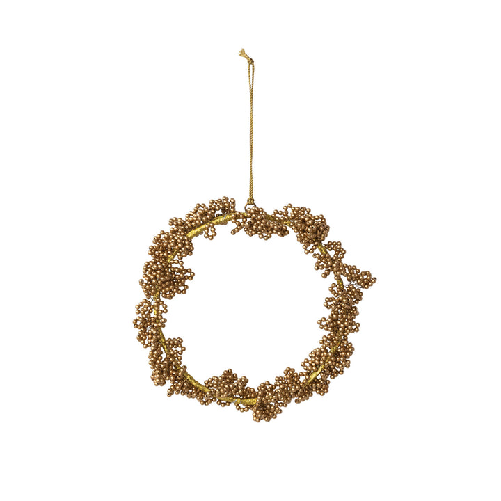 Gold handmade metal beaded wreath ornament with hanging string and classic gold finish.