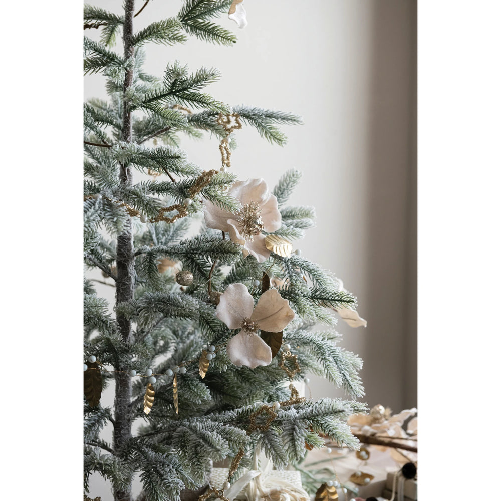 Blush faux magnolia flower garland with glitter and jewels.