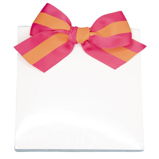 White square notepad with a pink and orange striped canvas ribbon bow on top. Available sizes: not specified.