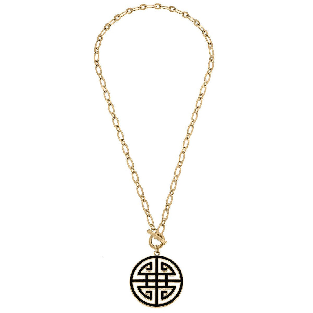 Gold chain necklace, 18.5", with large links and a round black enamel pendant featuring a geometric Asian-inspired pattern.