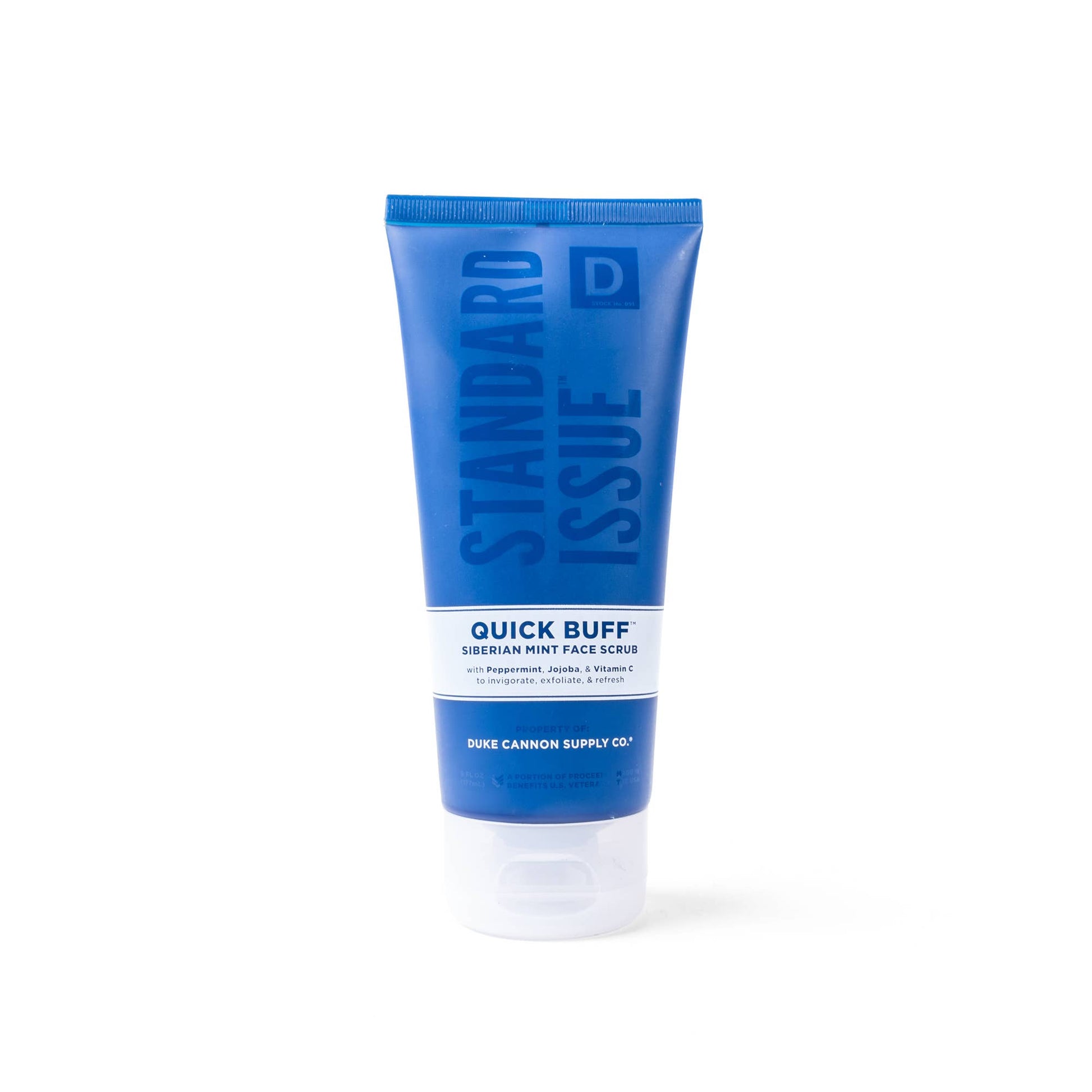 The product is a blue tube of "Standard Issue Quick Buff Face Scrub" by Duke Cannon Supply Co. It is designed to exfoliate and renew skin, containing natural ingredients that work gently to reveal a fresher complexion. The tube size available is 6 oz, making it compact and travel-friendly. Suitable for all skin types and crafted for daily use.