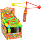 Clackers Candy: toy clacker with red and yellow plastic arms and balls, attached to fruity dextrose candy tube. Size: standard.