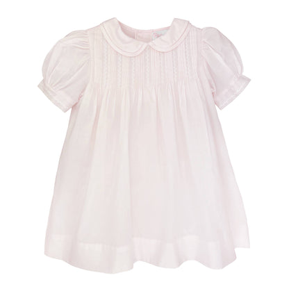 Handcrafted light pink baby dress with short puffed sleeves, Peter Pan collar, pintucked bodice. Available in sizes 0-24M.