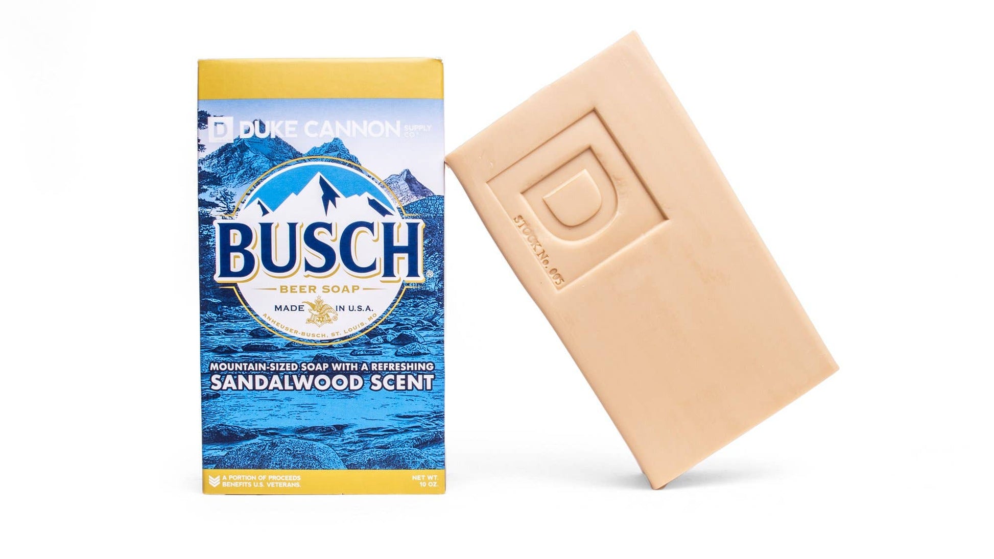 The product is a bar of Busch Beer Soap. It comes with packaging that has a blue mountain design and bears the message "mountain-sized soap with a refreshing sandalwood scent". The scent of the soap is sandalwood. No sizes are provided for this product.