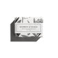 The product is a bath bar of Bourbon & Vanilla Soap. This soap comes in an aesthetically pleasing black and white packaging, adorned with elegant botanical illustrations. It is displayed isolated on a white background, suggesting its pure and clean attributes. The size of the soap bar is not specified in this description.