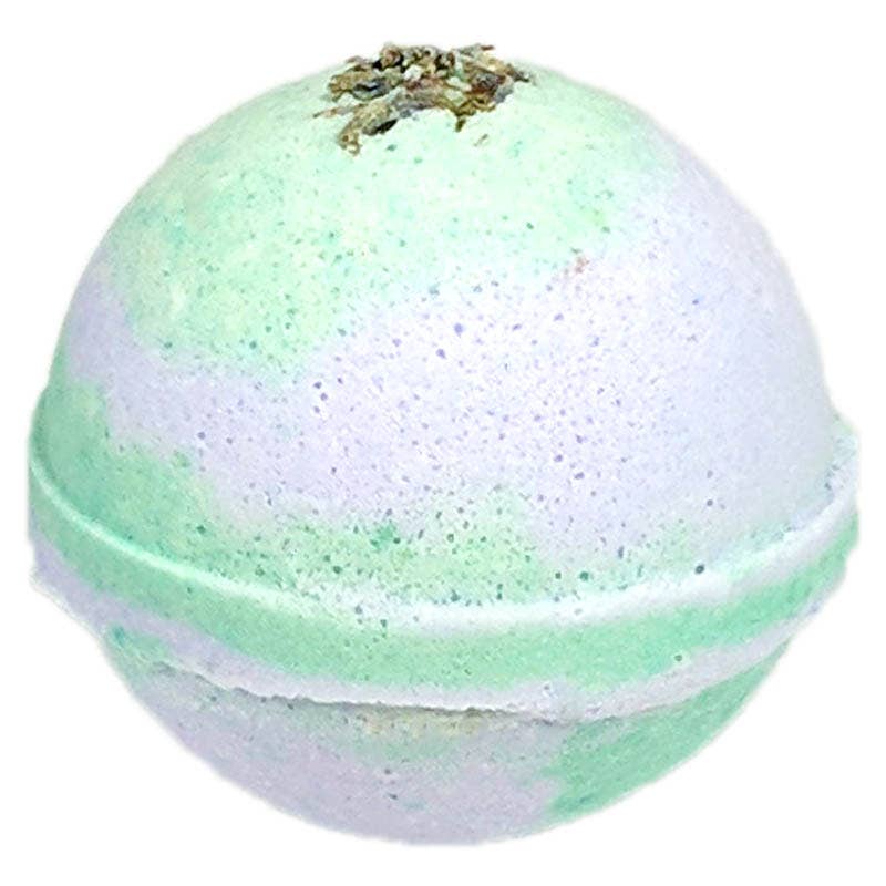 This is a Cucumber Lavender Bath Bomb. It has a distinct pale green hue with a speckled texture, and is topped with sprinkling of dried herbs. The bath bomb is heavily infused with a calming lavender fragrance.