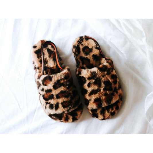 These leopard plush slippers have fake fur and a leopard pattern as well as an elastic band that wraps around your ankle for support