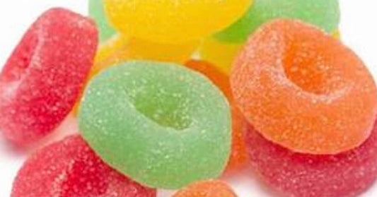 Gourmet Fruit Rings, sugar-coated in red, green, orange, yellow; available in 3/4 pound size.