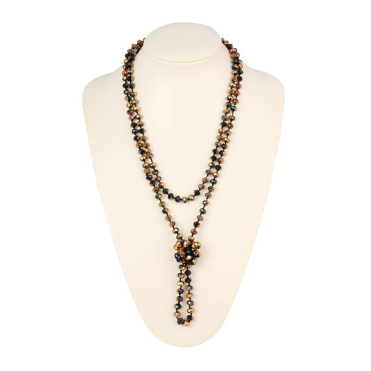 The HDN2209 necklace features 8mm black and gold glass beads, double layers, center knot. Available in multiple sizes.