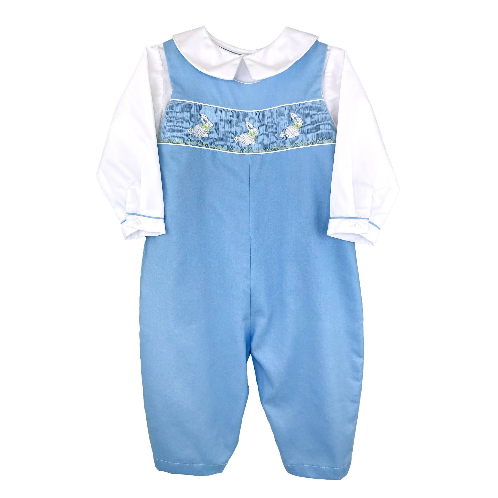 Baby boy's Easter Picture Smocked Easter Bunny Longall consisting of a light blue overall with a white shirt underneath, featuring a decorative blue band with picture smocked Easter bunnies across the chest.