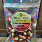 Clear, iridescent bag labeled “Freeze Dried Sour Wild Berry Skittles” with colorful freeze-dried treats; sizes: 2oz, 6oz.