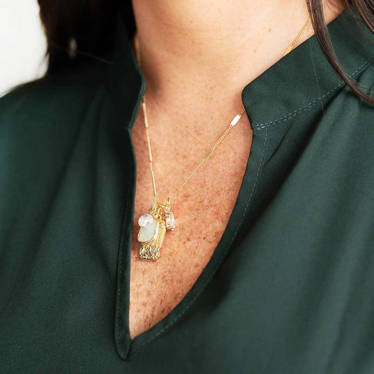 Gold Leah Necklace: layered design with two gold chains and small pendants. Available in 16", 18", and 20" lengths.