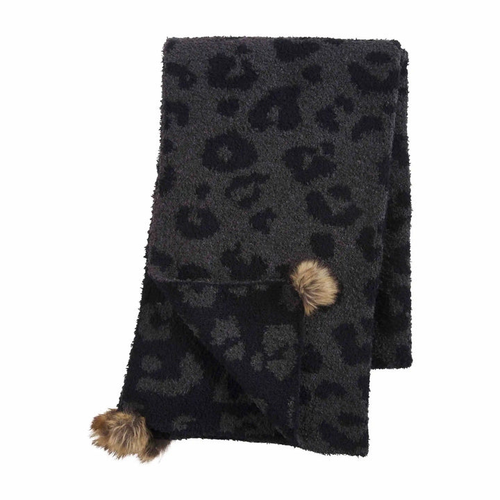 Dark gray leopard chenille scarf with two brown pom-poms on one corner. Available in multiple sizes.