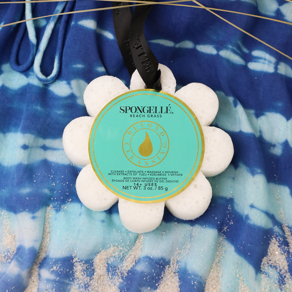 The Spongelle Wild Flowers Body Wash Infused Buffer is a uniquely crafted product designed in the shape of a flower. It comes with an infused body wash, offering a multi-use, cleansing, and exfoliating care routine. The size available is 85g.