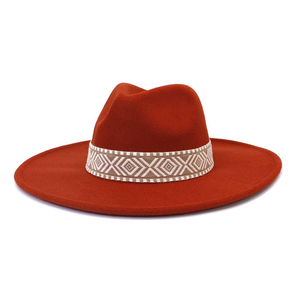 Rust-toned woolen jazz hat with peach heart top and Aztec-patterned cream and brown belt. Available in S, M, L.