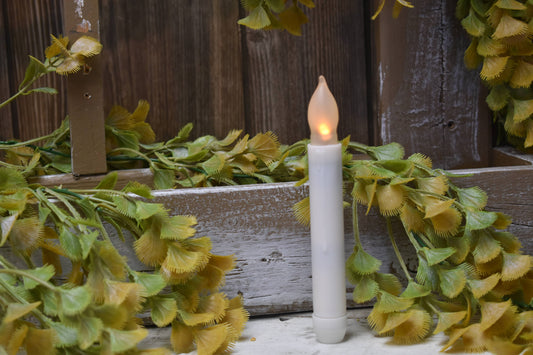 White LED Taper Candle, 6in size, flameless light source. Available in 6-inch length only.