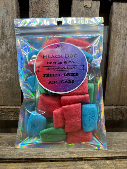 Holographic bag of Freeze Dried Candy made with Airheads contains vibrant, crunchy rectangular treats. Sizes: small, large.