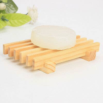 This is a white, oval soap bar accompanied by a Bamboo Soap Dish. The dish has an interesting slatted design, providing ventilation to the soap. The soap and dish come as a set. The sizes available for this set vary from small to large according to specific customer needs.