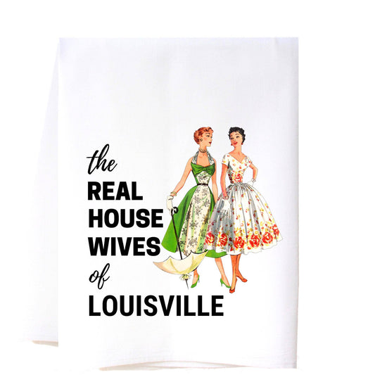 Flour sack towel with bold black text: "the REAL HOUSE WIVES of LOUISVILLE." Available in standard kitchen towel size.