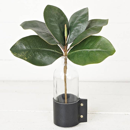 ISB71805 13in Evergreen Magnolia Leaves Pick with glossy artificial foliage in a black leather holder with metal rivets.