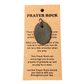 Black oval Prayer Rock with small ring, attached to brown "Prayer Rock" card. Available in multiple sizes.