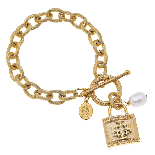 24k gold Jerusalem Cross Lock Bracelet with toggle clasp, engraved tag, freshwater pearl, and padlock charm. Sizes: S/M/L.