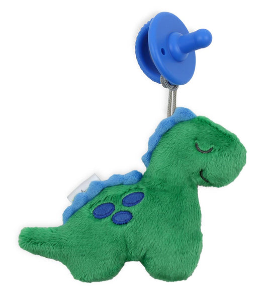 Green plush dinosaur baby toy with blue details and a Sweetie Pal™ Plush & Pacifier: Dino attached by a string, isolated on a white background.