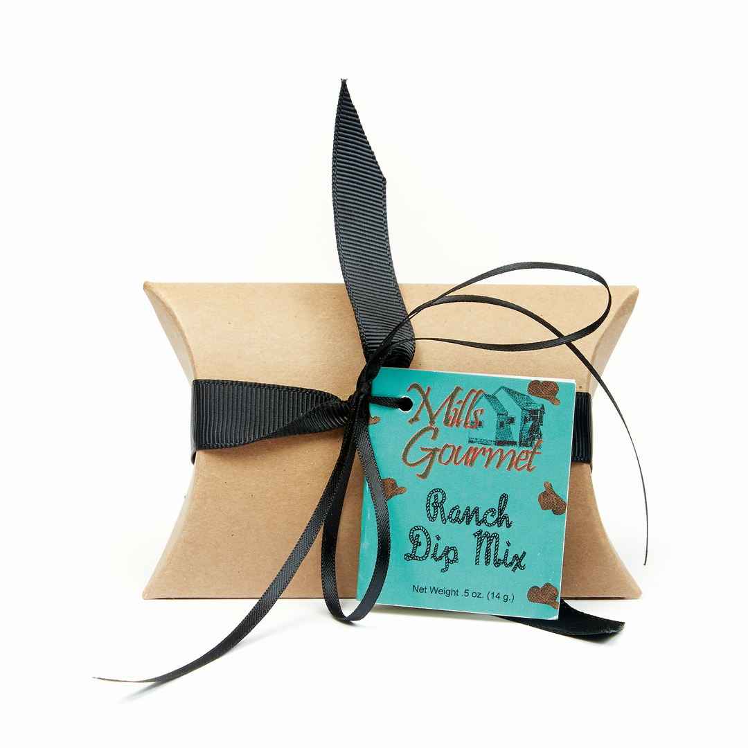 Small brown pillow box with black ribbon, turquoise "Ranch Dip Mix Case—MSG free" label, 0.5 oz (14g) size.