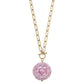 Gold chain with elongated links, toggle clasp, pink and white round pendant with patterns. Available in 16", 18", and 20".