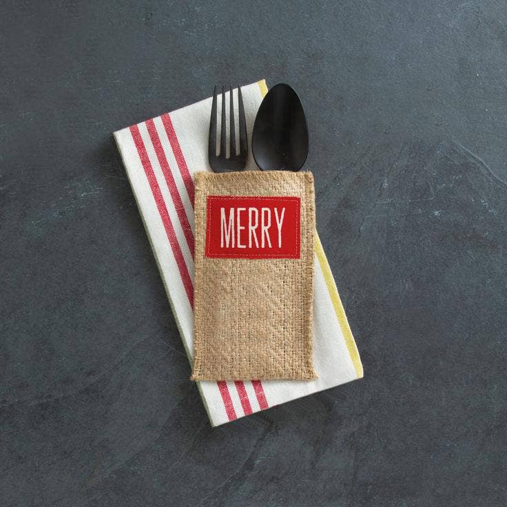 Merry Patch set of 8 burlap cutlery holders with a red “MERRY” patch.