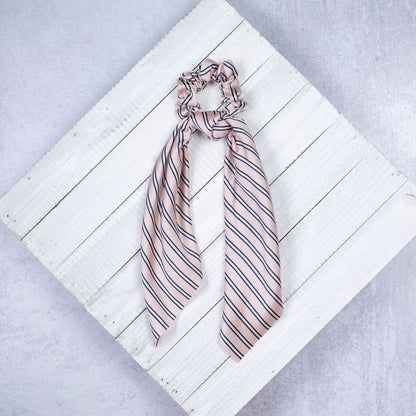 Pink Striped Hair Scrunchie Scarf with long navy and white striped ribbons. Size: one size.