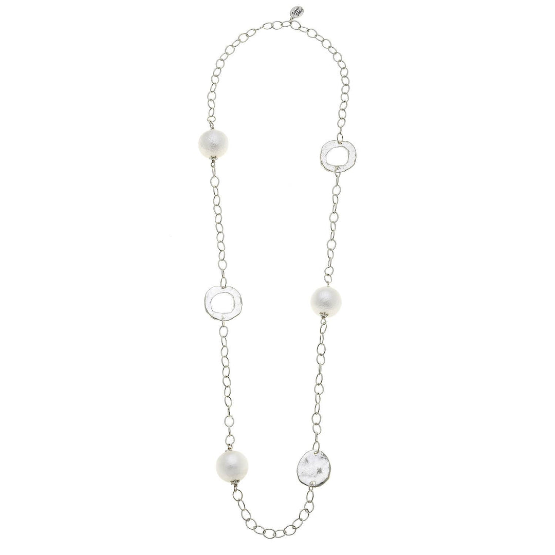 Sterling silver chain with four cotton pearls and three irregular silver circles. Available in 18", 24", and 30" lengths.