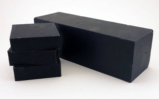 Black Soap Soap Slice: This product features three stacked segments, infused with activated charcoal. It is smaller in size than a standard yoga block.