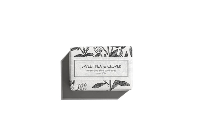 This Sweet Pea &amp; Clover Bath Bar offers a delicately floral fragrance. The soap comes in a stylish silver box adorned with botanical illustrations. It is designed to create a soothing lather for pure relaxation. Size options for this product are not specified.