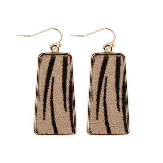 This pair of rectangular, gold-framed drop earrings features an appealing animal-printed leather bar pattern. The earrings are complemented by a secure fish hook design. Offered in one standard size suitable for all. Each earring dangles elegantly on a white background, adding allure to the accessory.