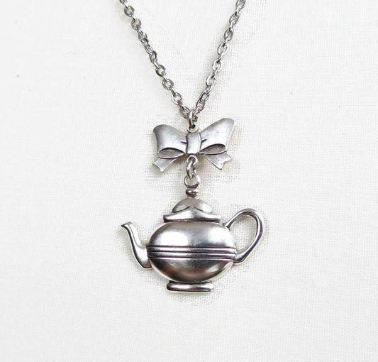 Maxine Teapot And Bow Necklace with teapot charm, decorative bow. Available sizes: S, M, L. Inspired by tea parties.