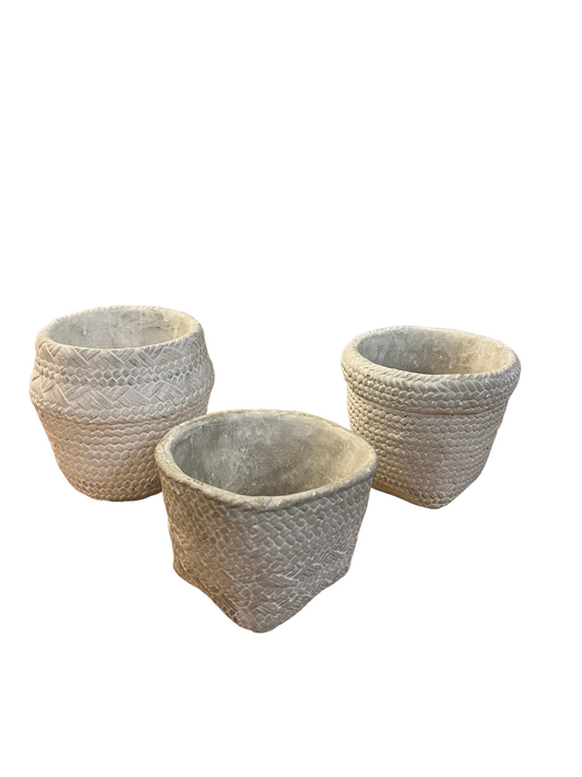 White basket-pattern planters, set of three in assorted shapes and sizes. Available in small, medium, and large.