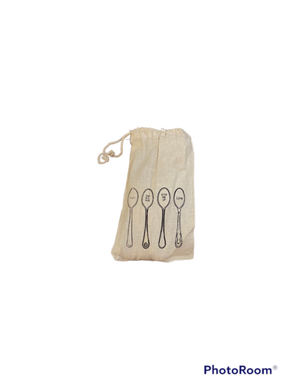 Beige drawstring pouch with brass spoons; "Live," "Life," "With," and "Love" printed. Available in small and large sizes.