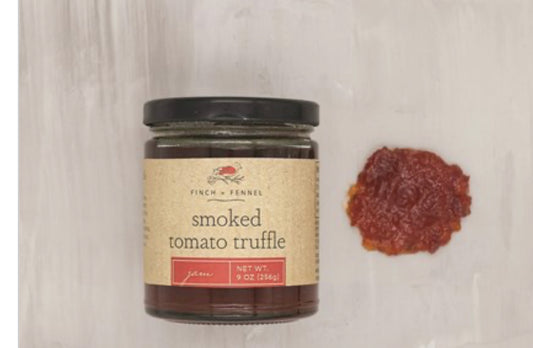 A jar labeled "Smoked Tomato Truffle Jam." Available in 8oz and 12oz sizes.
