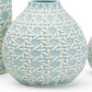 Round, light blue ceramic vase with white geometric interlocking pattern. Sizes available: small, medium, large.